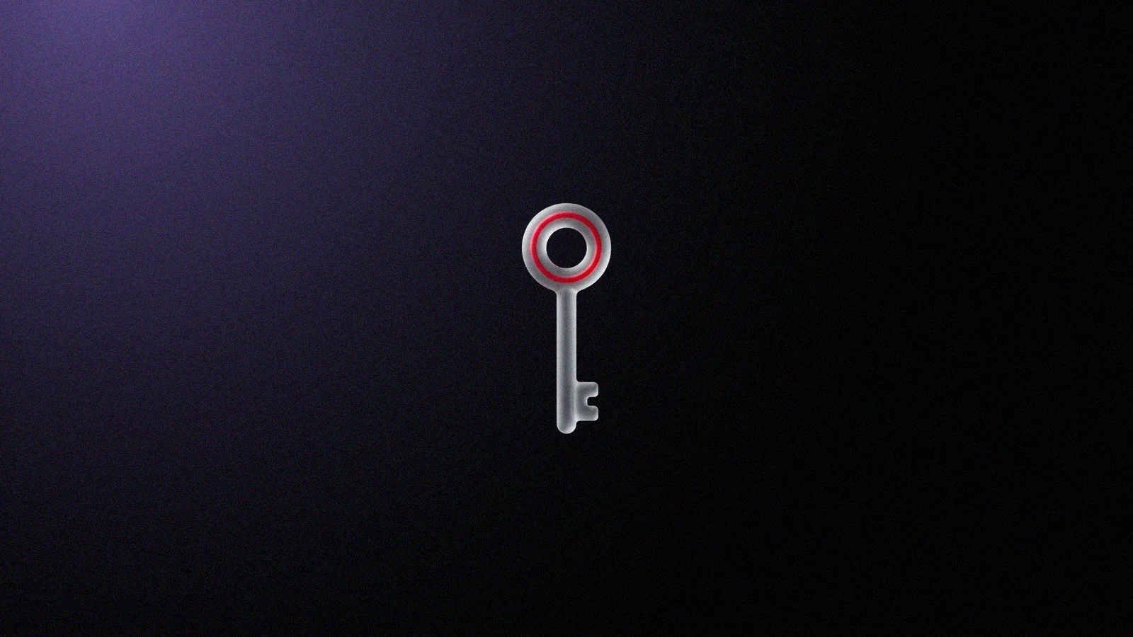 An old 3D key in frosted glass, with a red ring glowing inside its round bow, on a black background