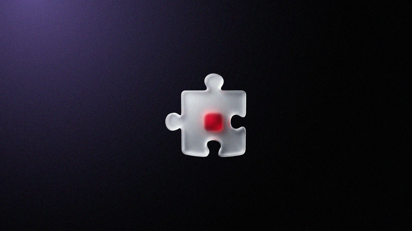 Peça de quebra-cabeça 3D de vidro fosco, com o miolo vermelho brilhando por dentro, sobre fundo preto